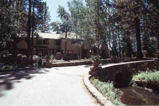 Handcrafted stone bridge over creek with 